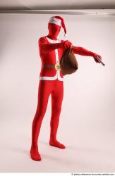 JOEL_ADAMSON CHRISTMAS VALLAIN WITH GUN AND BAG